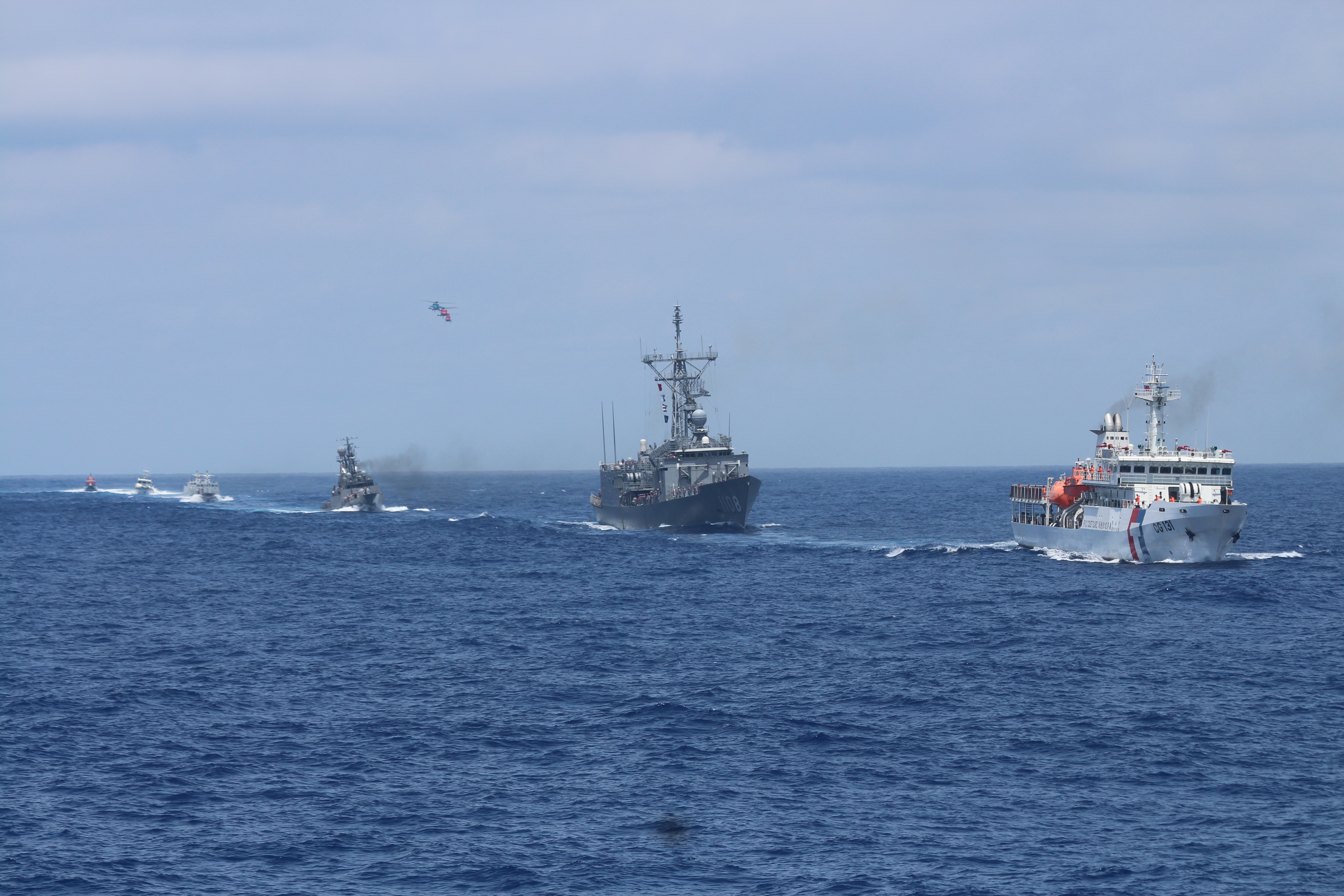 Coast Guard and the Department of Defense held a joint fishing protection and air and sea search and rescue drill